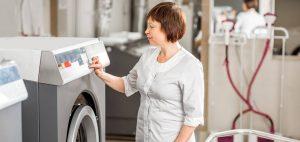 Woman operating dryer